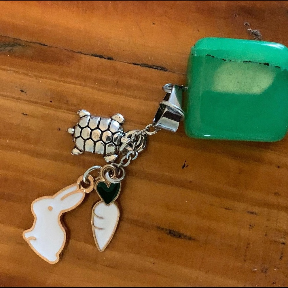 Green glass stone and 3 charms suitable for necklace or bracket